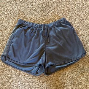 Gray mesh athletic shorts with drawstring waste